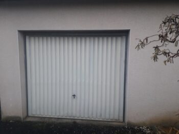 Remplacement porte de garage à Sadroc