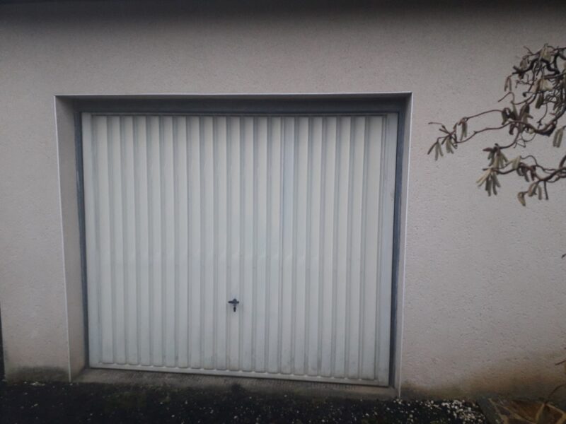 Remplacement porte de garage à Sadroc